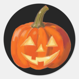 Geschilderd pompoen gezicht op zwart ronde sticker