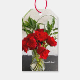 Geschilderde rode rozen op zwarte en witte achterg cadeaulabel