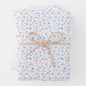 Geslacht onthullen poka-punten in papierbladen inpakpapier vel (In situ)