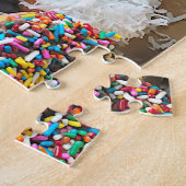 Gesorteerde donuts in een doos legpuzzel (Zijkant)