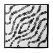 Gespannen zwarte gevlekte dozen op witte moderne k tegeltje (Voorkant)