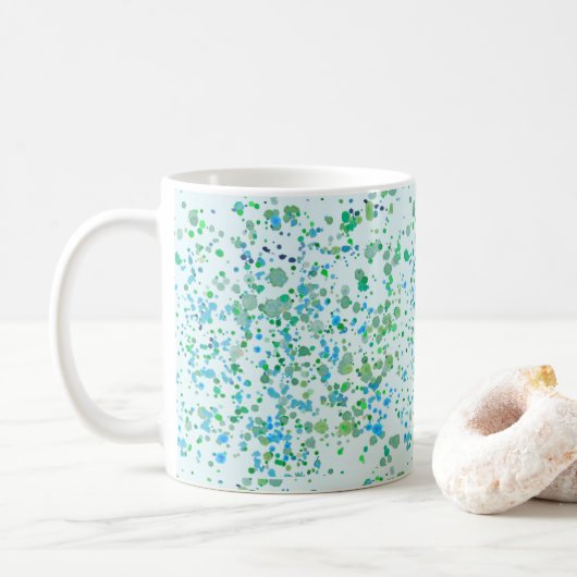 Gespikkelde gesplatterde verf blauw en groen koffiemok (Met donut)