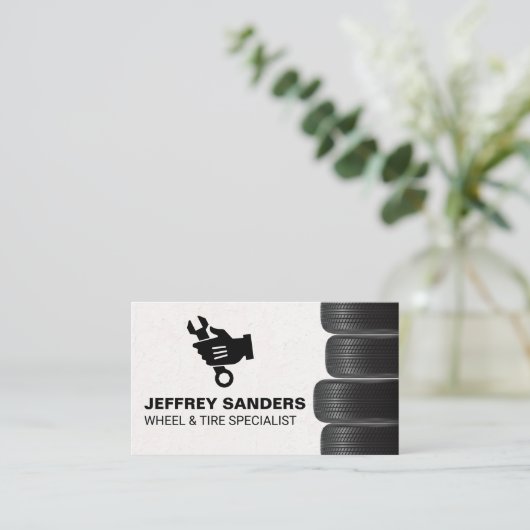 Gestapelde banden | monteur met sleutel logo visitekaartje (Staand voorkant)