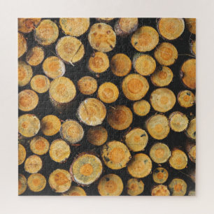 Gestapelde houten boomstammen legpuzzel