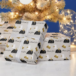 Gestileerde pompoenen in zwart, wit en goud cadeaupapier