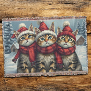 Gestreepte katten in preppy winterkleding en hoed deken