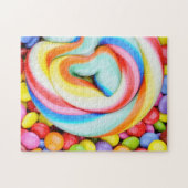 Gestreepte lipop en veelkleurige moerassen legpuzzel (Horizontaal)