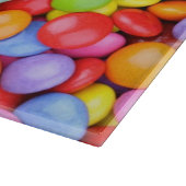 Gestreepte lipop en veelkleurige moerassen snijplank (Hoek)