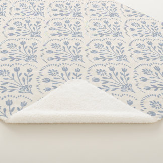 Gestuctuurd gedempt blauw bloemmotief met schelpra sherpa deken