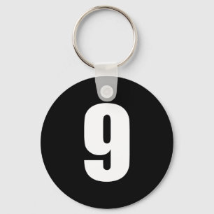 getal 9 in wit op zwarte sleutelhanger
