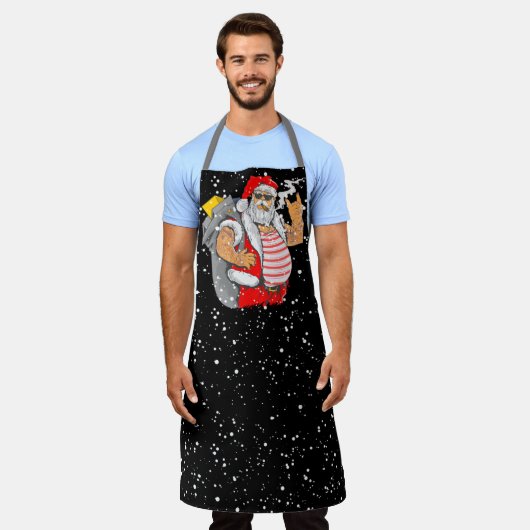 Getatoeëerde kerstman met rockerhand kerst schort (Gedragen)