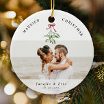 Getrouwd Kerst Schattige Mistletoe Passen getrouwd Keramisch Ornament<br><div class="desc">Koester uw eerste kerst samen met ons 'Married Christmas' ornament. #FirstChristmasJoy #PersonalizedKeepsake Gepersonaliseerd voor de vrolijke herinneringen van de pasgetrouwden met 2 favoriete trouwfoto's,  evenals een leuke waterverf mistletoe-illustratie,  uw namen en datum van huwelijken.🎄📸</div>