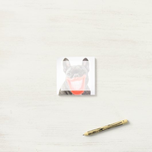 Getty Afbeeldingen | Een glimlende hond Post-it® Notes (Op bureau)