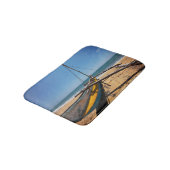 Gevist boot gesleept op strand badmat (Gekanteld)