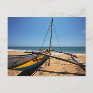 Gevist boot gesleept op strand briefkaart
