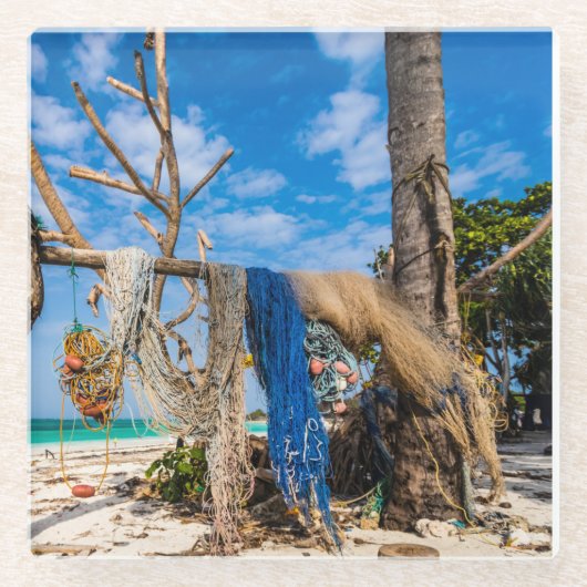 Gevist netten die op het strand drogen glazen onderzetter (Voorkant)