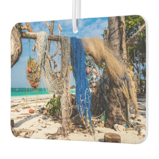 Gevist netten die op het strand drogen luchtverfrisser (Links)