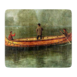 Gevist van een kano (vissers in een houten boot) snijplank