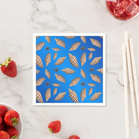 Gevlekte Junonia Seashells op Blauw Servetten (Insitu)
