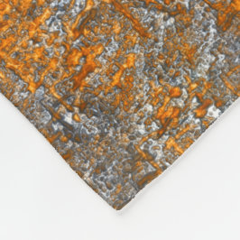 Gevoelig met gouden sinaasappel boven witgrijs fleece deken