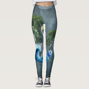 Geweldige pelikaan met golf- en palmbomen leggings
