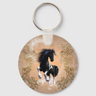 Geweldige wild paard met bloemelementen sleutelhanger