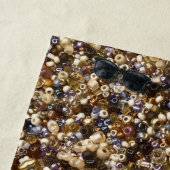 Gewichten van zaadkralen strandlaken (In situ)