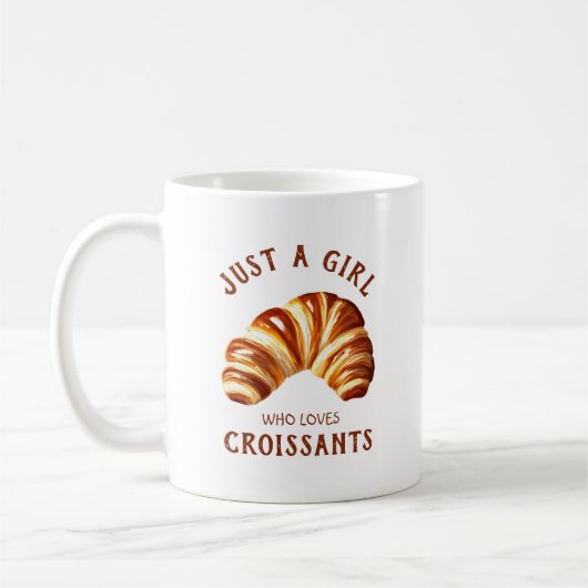 Gewoon een meisje dat van croissants houdt koffiemok (Links)
