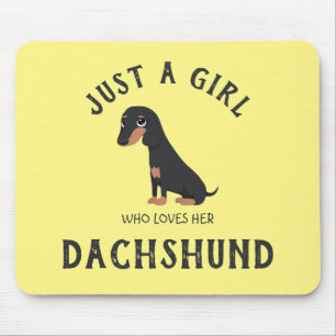 Gewoon een meisje dat van haar Dachshund Muismat h