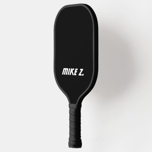 Gewoon een zwarte Pickleball Paddle met moderne na (Links)