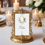 Gewoon Elegant Kerst Bloemen Monogram Kaart<br><div class="desc">Deze prachtige botanische winterkaart met tafelnummers bevat boeketten van ivoren rozen en bloemetjes,  rode hulstbessen,  sparren en gouden sneeuwvlokken die een elegant gouden label omringen voor uw monogram op een bleke parelgrijze achtergrond. Inclusief bewerkbare tekstvelden.</div>