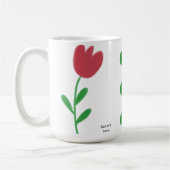 Gewoon mooie rode tulpen bloemen over wit koffiemok (Links)