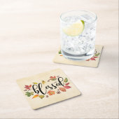 Gezegend met zwarte kalligrafie en herfstbladeren kartonnen onderzetters (Insitu)