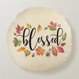 Gezegend met zwarte kalligrafie en herfstbladeren rond kussen