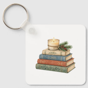 Gezellige boeken met kaars en den sleutelhanger