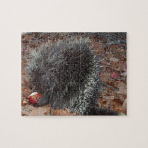 Gezellige herfststekelvarken en rode appel aangepa legpuzzel