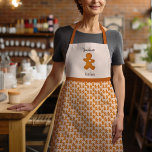 Gezellige Kerst Gingerbread Man Oma's Keuken Schort<br><div class="desc">Dit feestelijke ontwerp is gemaakt met behulp van mijn zoete Scandinavische geïnspireerde koekjes in de vorm van een peperkoekman, een kerstboom en een ster omringd door citrus, gedroogde kruiden, groen en bessen die het gevoel oproepen van een warme cottage-keuken bij oma's gevuld met de geuren van vakantiebakken! De onderkant is...</div>