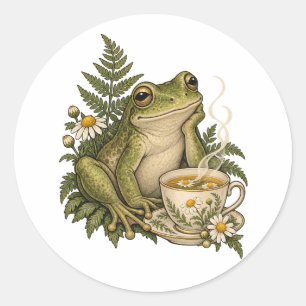Gezellige kikker met kamillethee en varens ronde sticker