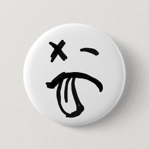 Gezicht met zwarte ogen en tongen tikken uit ronde button 5,7 cm