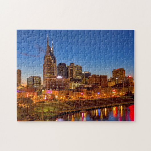Gezicht op het stadssilhouet bij schemering legpuzzel (Horizontaal)