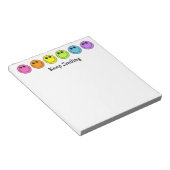 Gezichten blijven glimlachen notitieblok (Schuin)