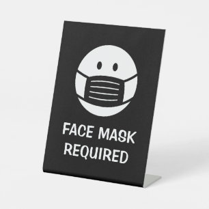 Gezichtsmasker vereist detailhandelsteken voor bur reclamebord met voetstuk