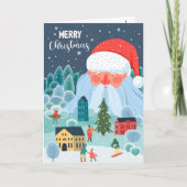 Giant Santa houdt toezicht op kerststad Kaart (Voorkant)