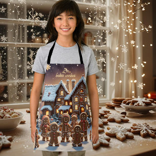 Gingerbread huis en schattige peperkoek familie schort