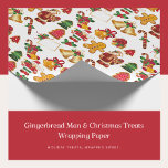Gingerbread Man & Christmas Treats Wrapping Paper Cadeaupapier<br><div class="desc">Wikkel uw feestelijke geschenken in pure feestvreugde met ons Gingerbread Man & Christmas Treats Wrapping Paper. Dit prachtige ontwerp is een feestelijk feest voor de ogen, met een grillig patroon van peperkoekmannen, snoepstokken, klokken en kerstkousen, allemaal weergegeven met een charmant, kleurrijk detail. Het is het perfecte papier om je cadeaus...</div>