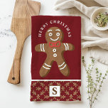 Gingerbread Man Red Monogram Vrolijk Kerstfeest Theedoek<br><div class="desc">Vier het vakantieseizoen met deze aangepaste peperkoek man Merry Christmas keukenhanddoek. Met een leuke peperkoek man met een rode strik stropdas, een feestelijke "Merry Christmas" groet, en een gepersonaliseerde monogram op een rode achtergrond, deze handdoek voegt een leuke en feestelijke touch aan uw keuken decor. Perfect voor het schenken of...</div>