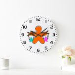 Gingerbread Puppet Master Controlling Characters Grote Klok<br><div class="desc">Voeg artistieke flair toe aan uw ruimte met deze wandklok met een levendige poppenmeesterillustratie. De opvallende oranje figuur die blauw en roze personages bestuurt, creëer heeft een gedurfd en modern ontwerp dat elke kamer unieker maakt. Praktisch en stijlvol, deze klok is ideaal voor thuis, kantoor of studio-inrichting, waarbij functionaliteit wordt...</div>