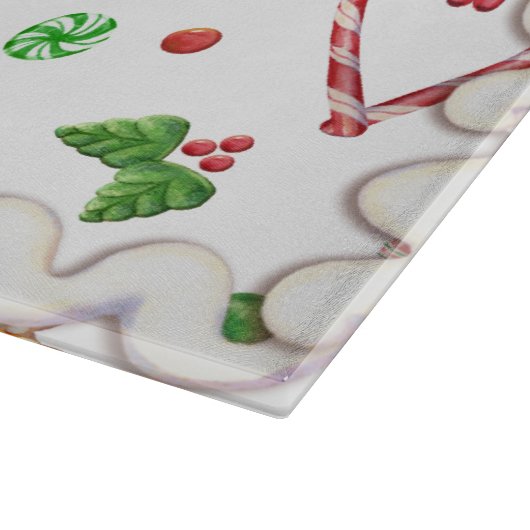 Gingerbrood en hart geïsoleerd snijplank (Hoek)