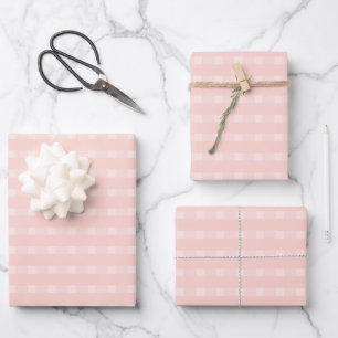 Gingham patroon in roze en pastel perzik inpakpapier vel