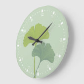 Ginkgo laat achtergrondkleuren achter grote klok (Hoek)